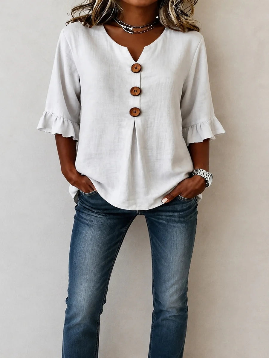 Sofía- Blusa con botones de madera y volantes