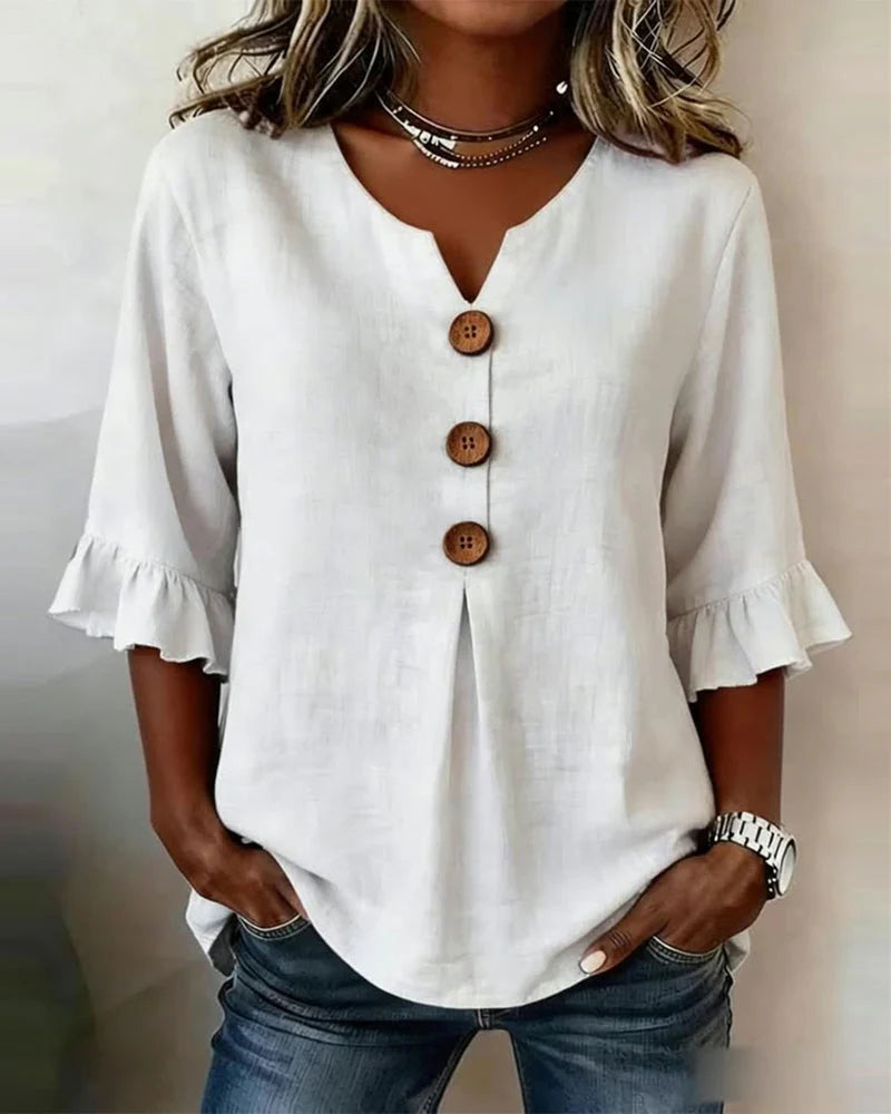 Sofía- Blusa con botones de madera y volantes