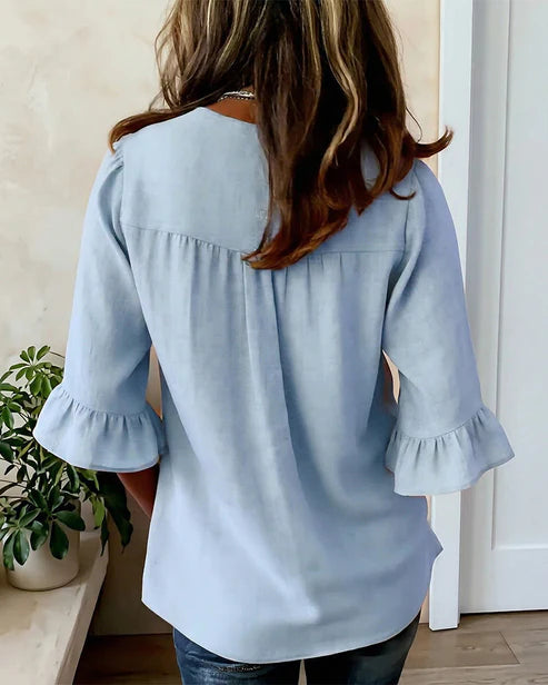Sofía- Blusa con botones de madera y volantes