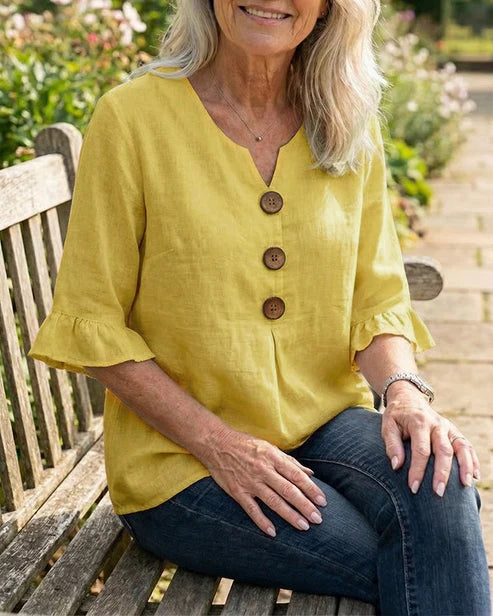 Sofía- Blusa con botones de madera y volantes