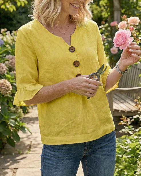 Sofía- Blusa con botones de madera y volantes