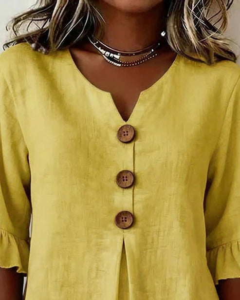 Sofía- Blusa con botones de madera y volantes
