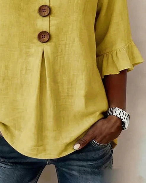 Sofía- Blusa con botones de madera y volantes