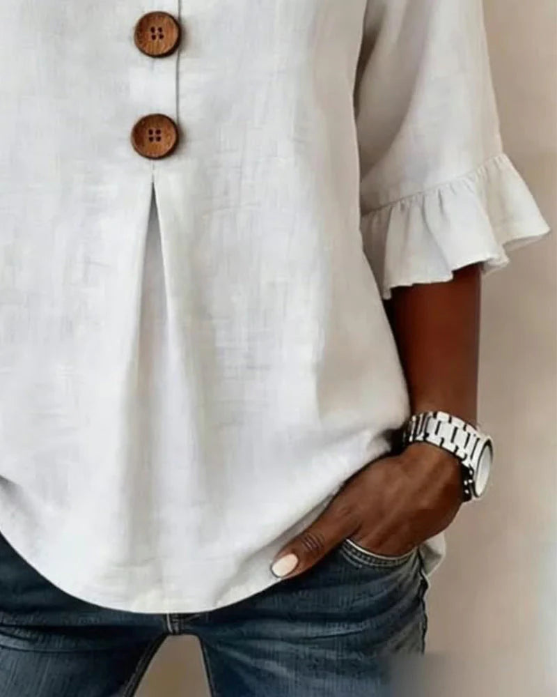 Sofía- Blusa con botones de madera y volantes