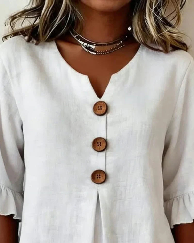 Sofía- Blusa con botones de madera y volantes