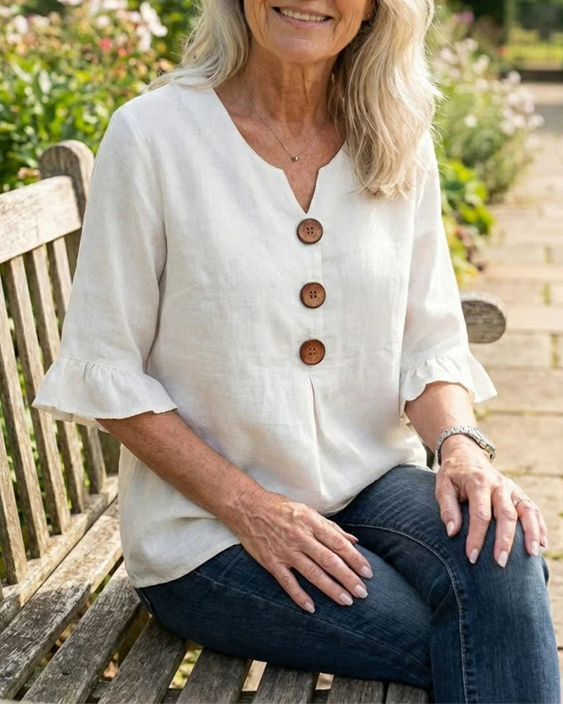 Sofía- Blusa con botones de madera y volantes