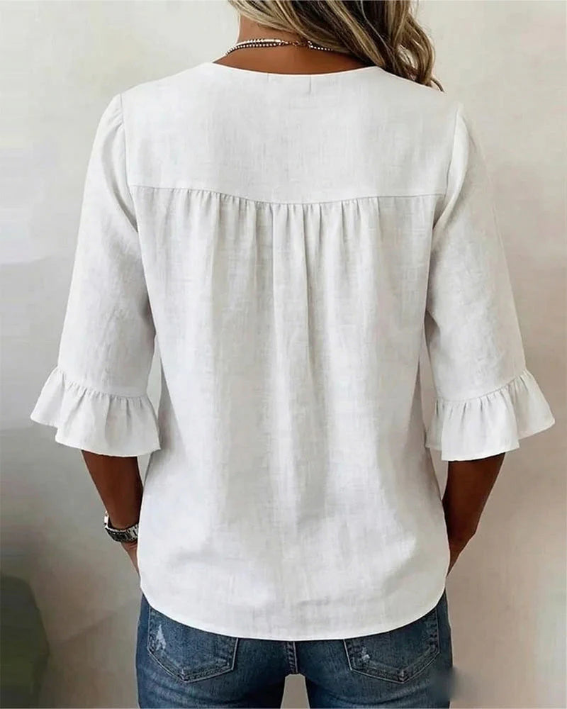 Sofía- Blusa con botones de madera y volantes